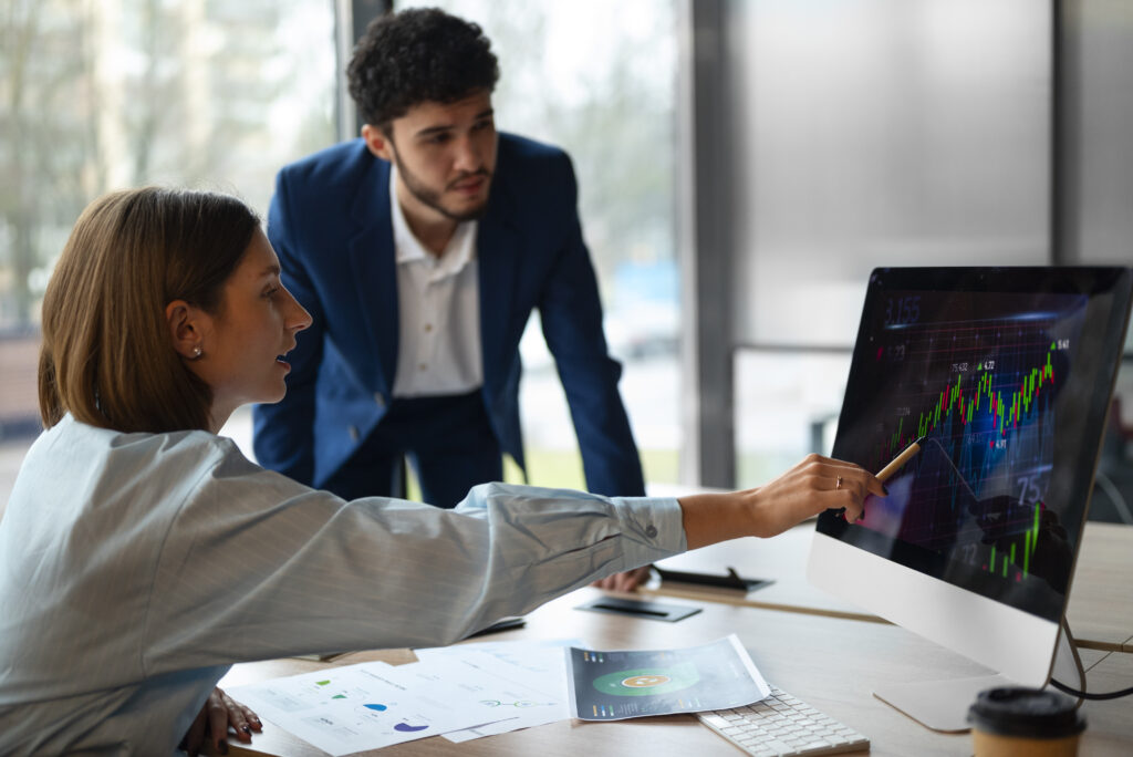 people office analyzing checking finance graphs