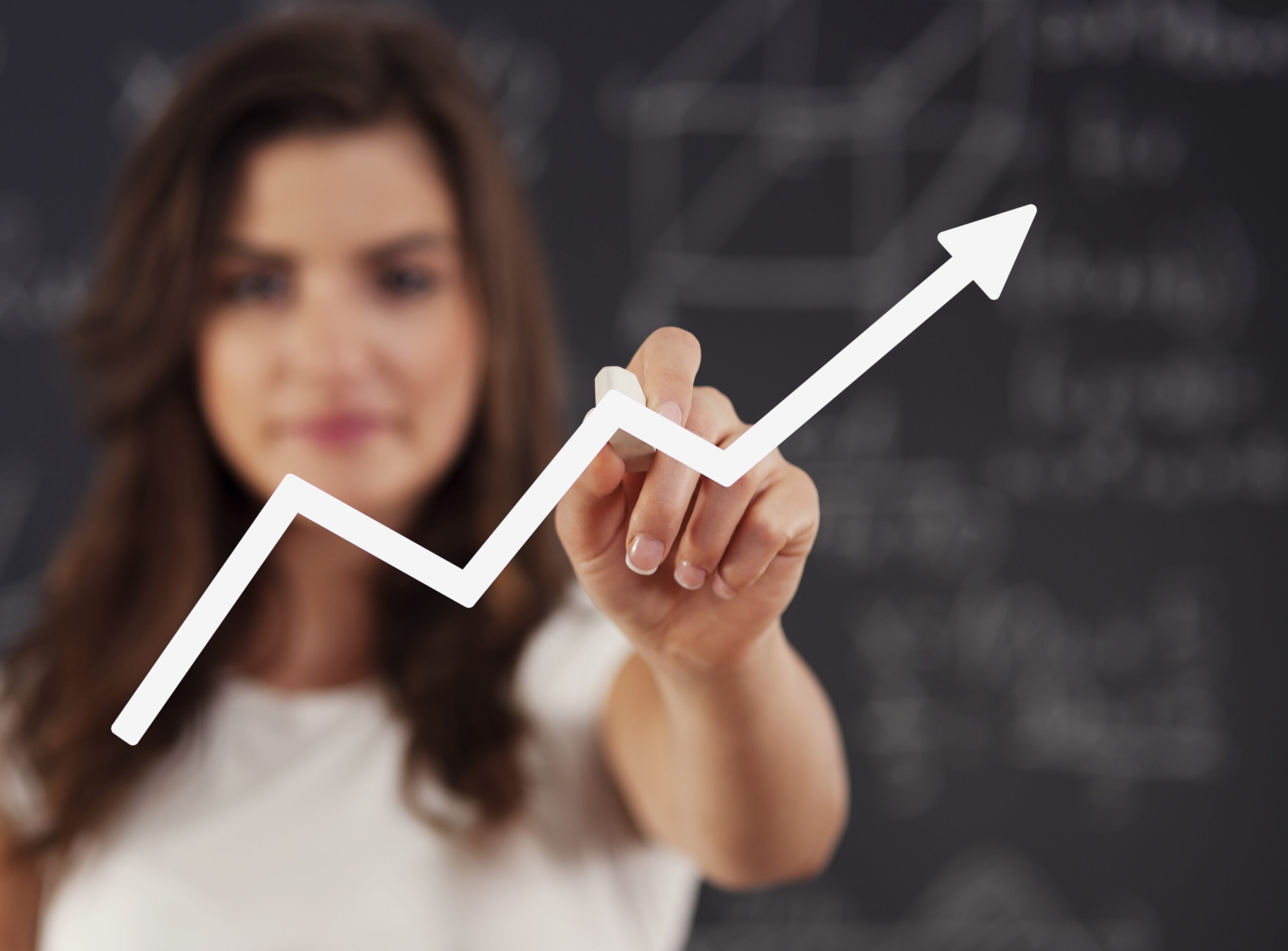 woman drawing graph