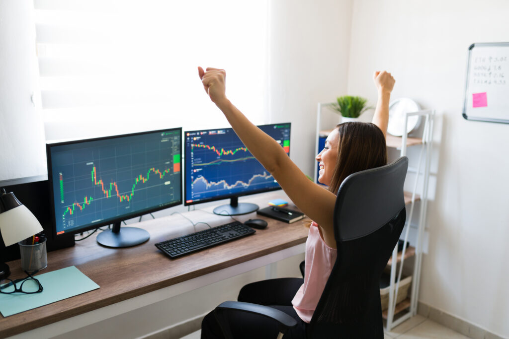 happy woman because the stock market went up
