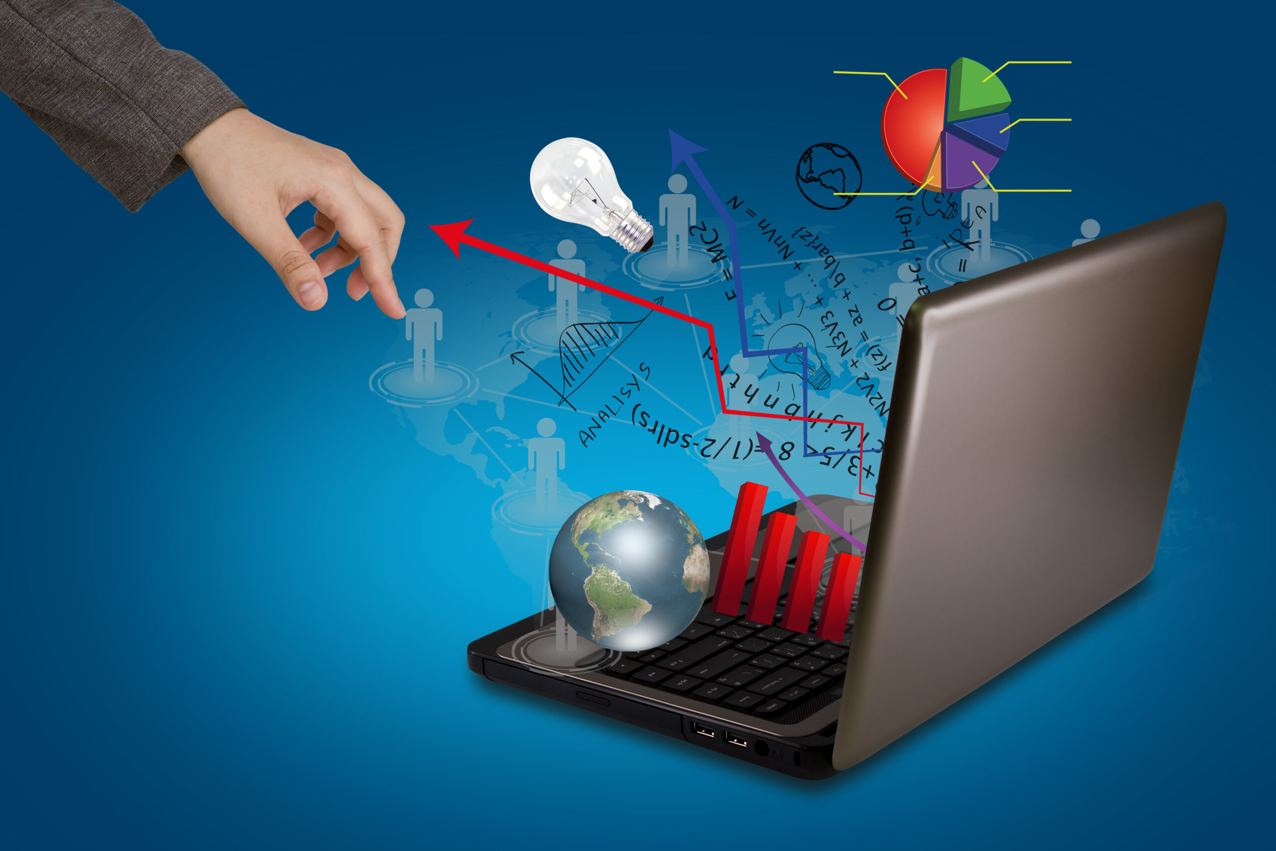 laptop and financial graphs